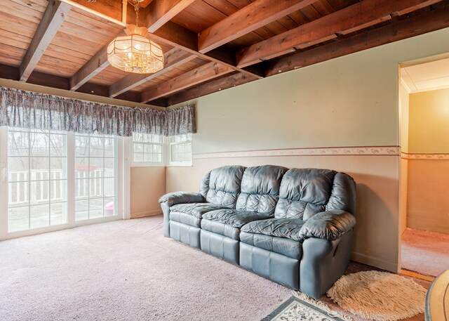 84 Hillside Rd, Westbrook, ME 04092 - living room featuring wooden ceiling, carpet flooring, beam ceiling, and a notable chandelier