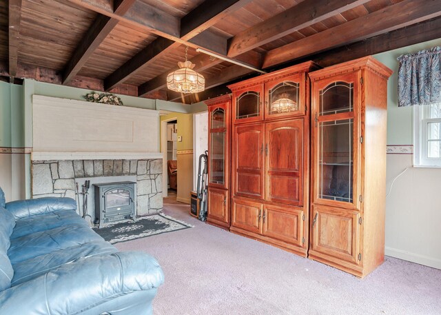 84 Hillside Rd, Westbrook, ME 04092 - unfurnished living room featuring light colored carpet, wood ceiling, beam ceiling, and an inviting chandelier