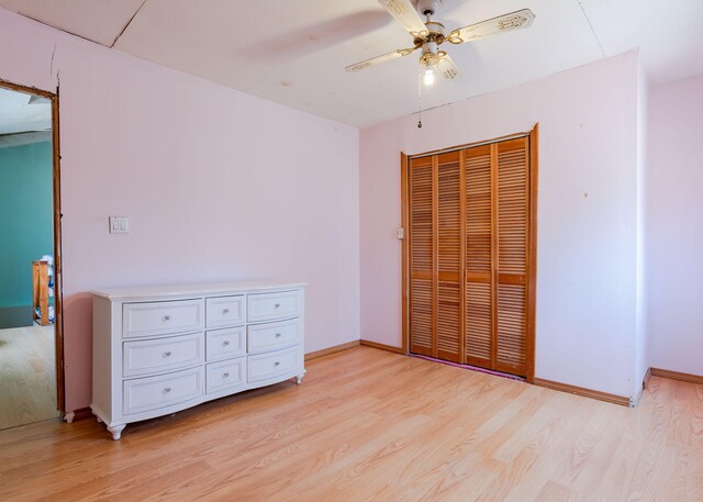 84 Hillside Rd, Westbrook, ME 04092 - unfurnished bedroom with a closet, light wood finished floors, baseboards, and ceiling fan