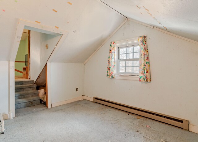 84 Hillside Rd, Westbrook, ME 04092 - additional living space with lofted ceiling, stairway, and a baseboard radiator