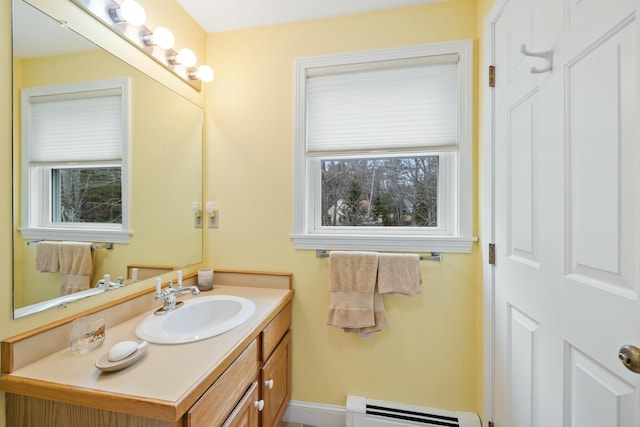 12 Ephraim Tyler Way Unit 12, Kennebunk, ME 04043 - bathroom featuring baseboard heating and vanity