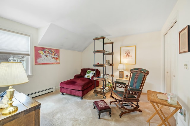 12 Ephraim Tyler Way Unit 12, Kennebunk, ME 04043 - sitting room with a baseboard heating unit, carpet flooring, and lofted ceiling