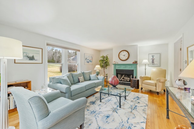 12 Ephraim Tyler Way Unit 12, Kennebunk, ME 04043 - living area with wood-type flooring and a fireplace