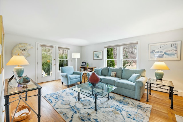12 Ephraim Tyler Way Unit 12, Kennebunk, ME 04043 - living area with healthy amount of natural light and wood finished floors