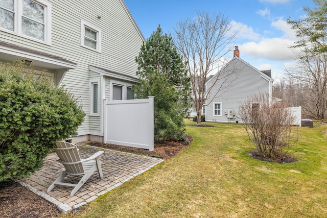 12 Ephraim Tyler Way Unit 12, Kennebunk, ME 04043 - view of green lawn featuring a patio area