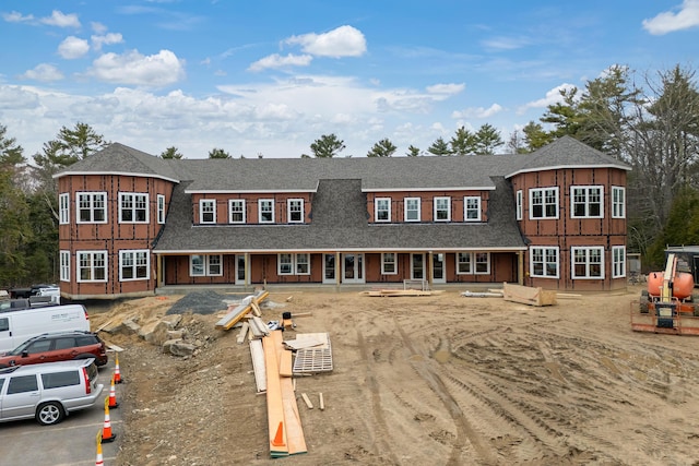 view of front of house featuring a shingled roof
