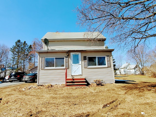 9 Locust St, Madison, ME 04950 - bungalow-style house featuring a front yard and entry steps