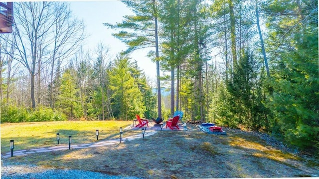 exterior space with a forest view