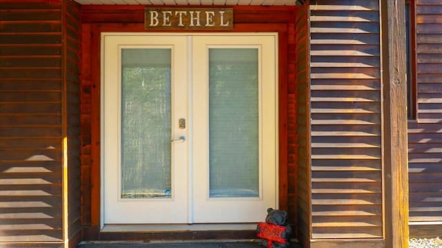 entrance to property featuring french doors