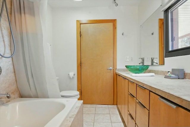full bath with tile patterned flooring, toilet, and vanity