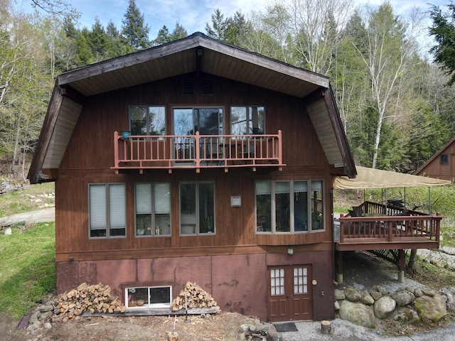 823 Grindstone Rd, Medway, ME 04460 - back of house with a wooden deck
