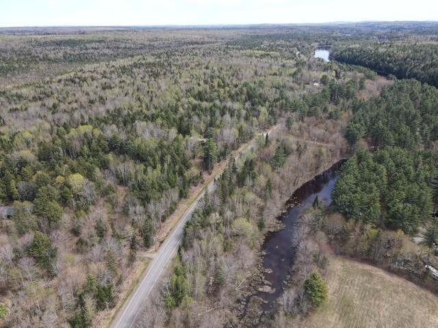 823 Grindstone Rd, Medway, ME 04460 - aerial view of property's location featuring a forest and a nearby body of water
