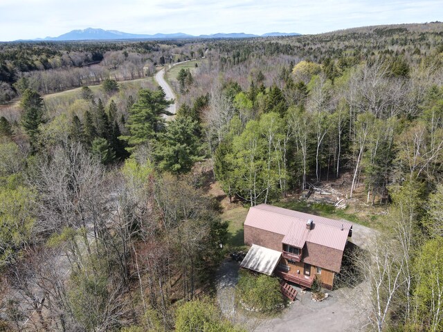823 Grindstone Rd, Medway, ME 04460 - aerial view of property and surrounding area with a forest and mountains