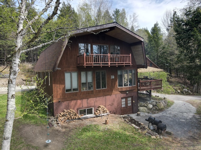 823 Grindstone Rd, Medway, ME 04460 - chalet / cabin with a balcony and a deck
