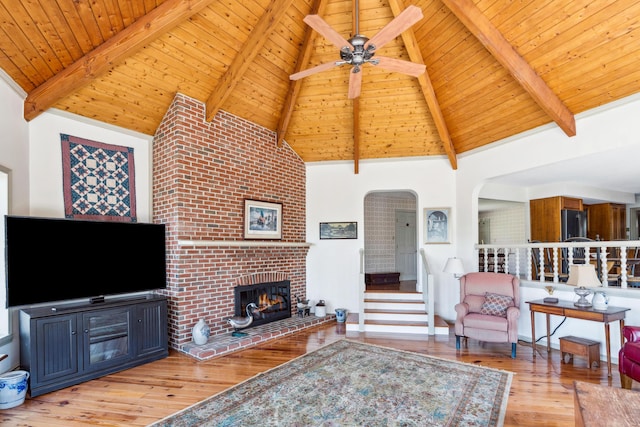 126 Middle Rd, Woolwich, ME 04579 - living room with beamed ceiling, wood ceiling, hardwood / wood-style flooring, and high vaulted ceiling