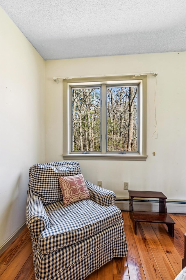 126 Middle Rd, Woolwich, ME 04579 - bedroom with a textured ceiling and wood finished floors