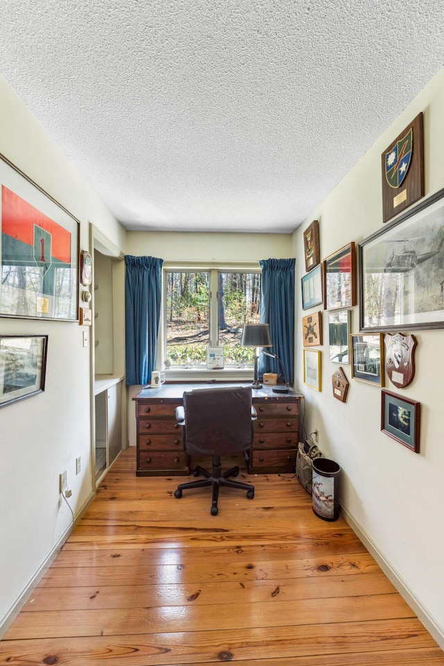 126 Middle Rd, Woolwich, ME 04579 - office area with light wood finished floors and a textured ceiling