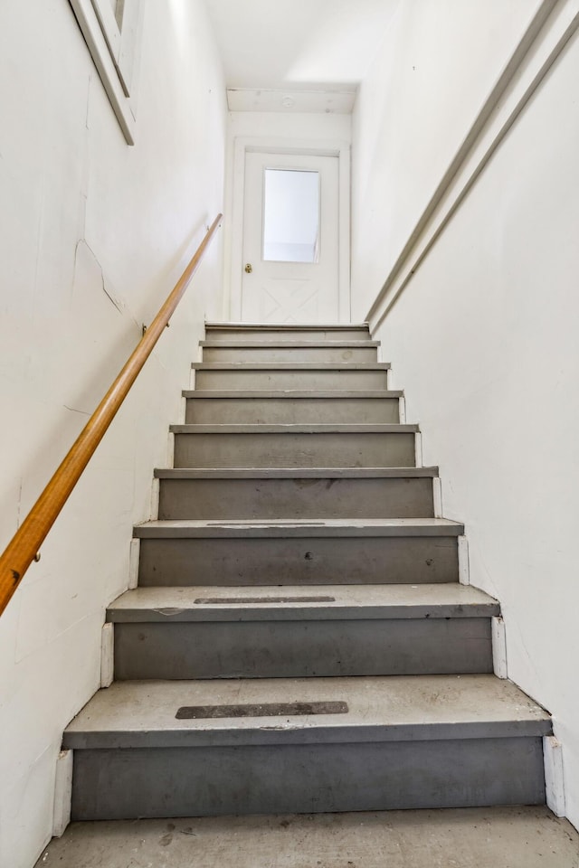 126 Middle Rd, Woolwich, ME 04579 - staircase featuring unfinished concrete flooring