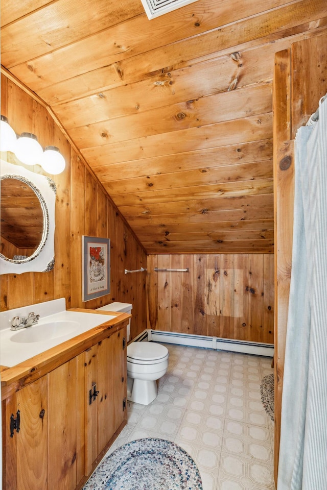 126 Middle Rd, Woolwich, ME 04579 - bathroom with wooden ceiling, tile patterned floors, toilet, lofted ceiling, and wooden walls