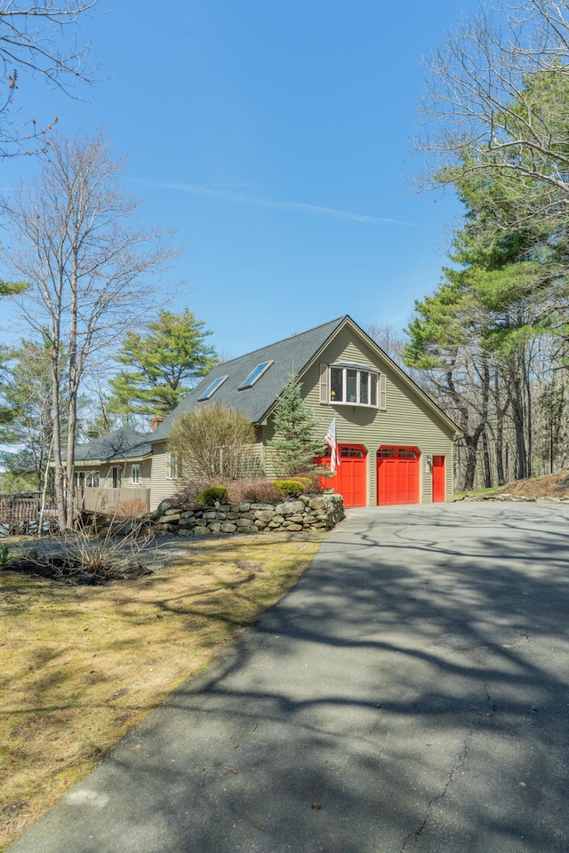 126 Middle Rd, Woolwich, ME 04579 - view of front facade featuring driveway and a garage