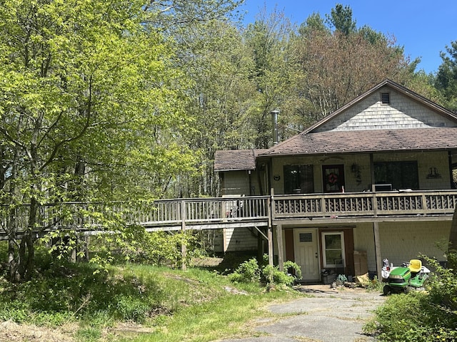 932 Bunker Hill Rd, Jefferson, ME 04348 - rear view of house with a deck and a shingled roof