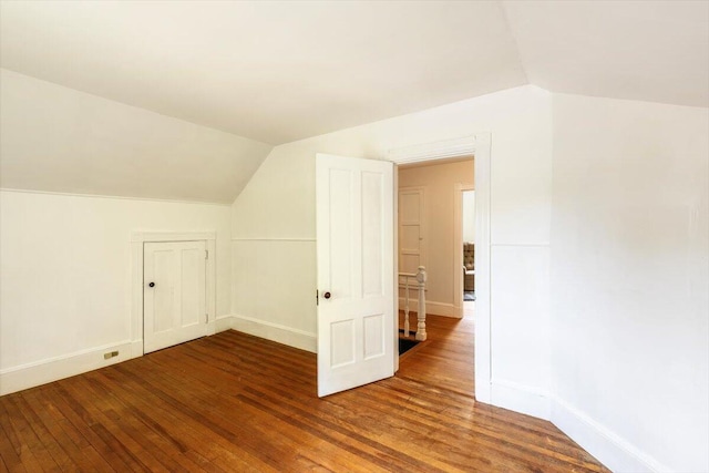 22 Mills Rd, Newcastle, ME 04553 - additional living space with vaulted ceiling and wood finished floors