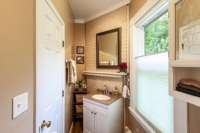 22 Mills Rd, Newcastle, ME 04553 - half bathroom with vanity and tasteful backsplash
