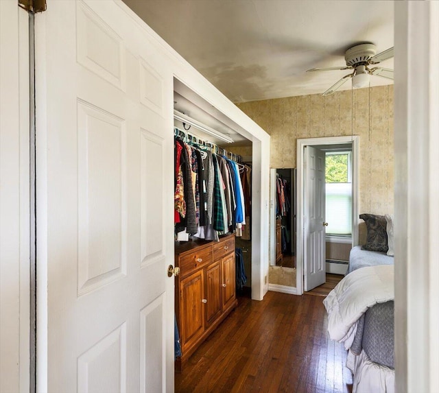 22 Mills Rd, Newcastle, ME 04553 - bedroom featuring dark wood-style flooring, baseboard heating, and ceiling fan