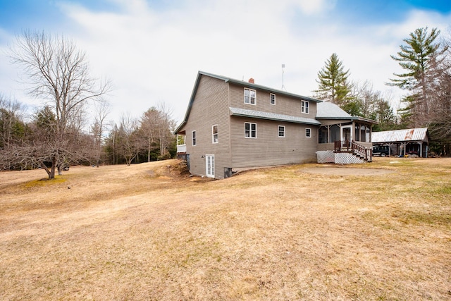 129 Bailey Hill Rd, New Sharon, ME 04955 - back of house with stairs, a yard, a sunroom, and a chimney