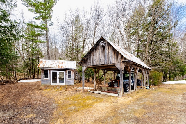 129 Bailey Hill Rd, New Sharon, ME 04955 - view of home's community with an outdoor structure and a detached carport