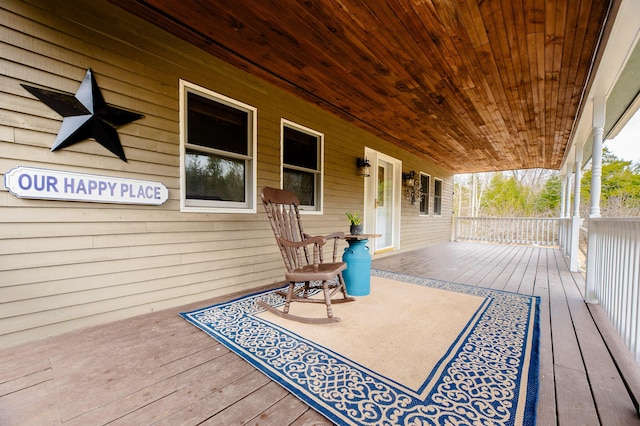 129 Bailey Hill Rd, New Sharon, ME 04955 - wooden deck with a porch