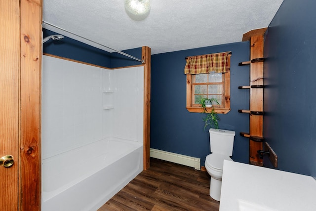 129 Bailey Hill Rd, New Sharon, ME 04955 - full bathroom with baseboard heating, wood finished floors, a textured ceiling, baseboards, and toilet