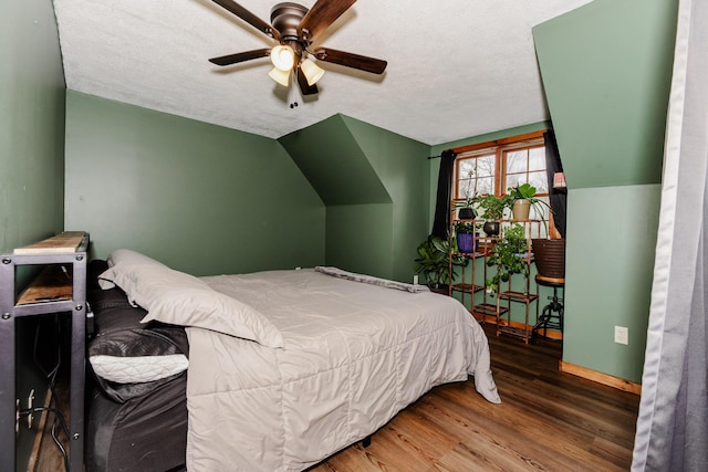 129 Bailey Hill Rd, New Sharon, ME 04955 - bedroom featuring baseboards, a ceiling fan, wood finished floors, and a textured ceiling