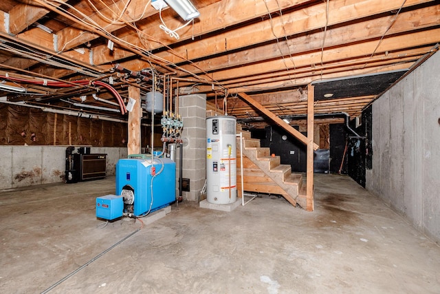 129 Bailey Hill Rd, New Sharon, ME 04955 - unfinished below grade area with water heater, stairway, and a heating unit