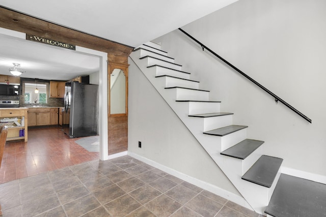 staircase with baseboards