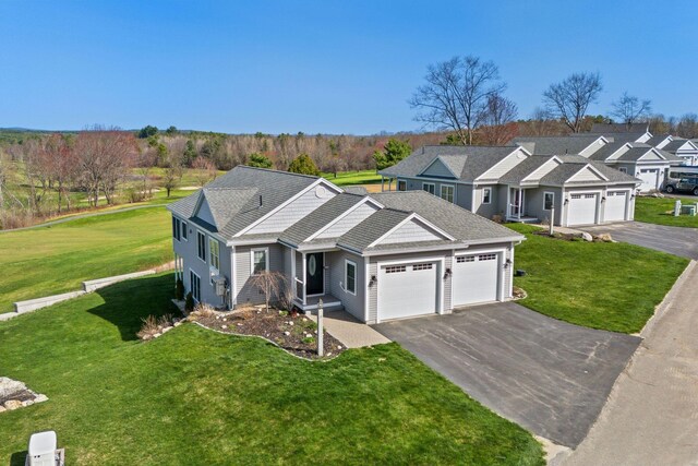 15 Callaway Dr Unit 15, Gray, ME 04039 - view of front of house featuring aphalt driveway, an attached garage, a front lawn, and a residential view