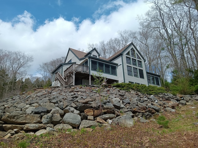5 Southernpoint Rd, Bristol, ME 04564 - view of home's exterior with a wooden deck and a sunroom