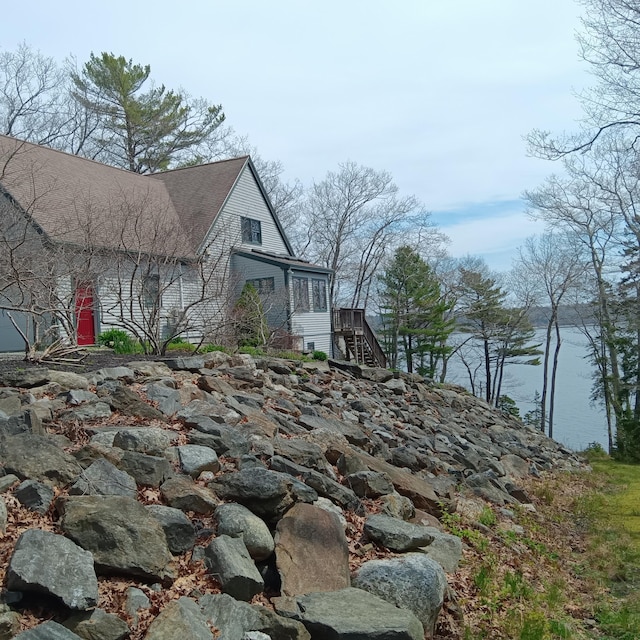 5 Southernpoint Rd, Bristol, ME 04564 - view of side of home with stairway and a water view