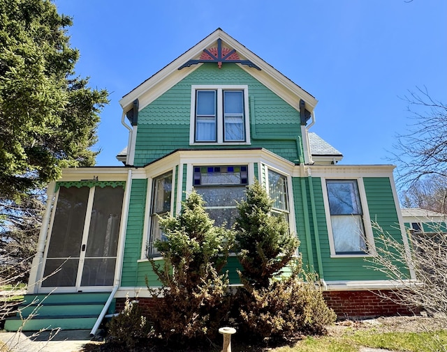 14 Water St, Vinalhaven, ME 04863 - rear view of property with a sunroom