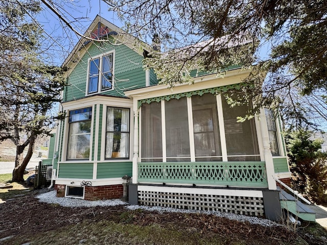 14 Water St, Vinalhaven, ME 04863 - view of side of home with a sunroom