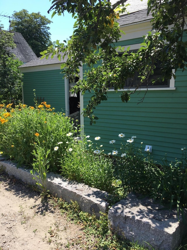 14 Water St, Vinalhaven, ME 04863 - view of home's exterior with roof with shingles
