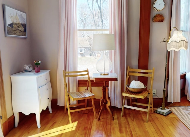 14 Water St, Vinalhaven, ME 04863 - living area with a healthy amount of sunlight and light wood finished floors