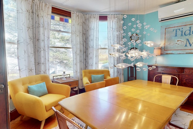 14 Water St, Vinalhaven, ME 04863 - dining space with crown molding and an AC wall unit