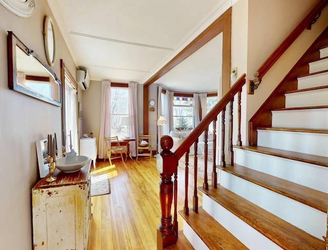 14 Water St, Vinalhaven, ME 04863 - stairway with wood-type flooring and a wall unit AC