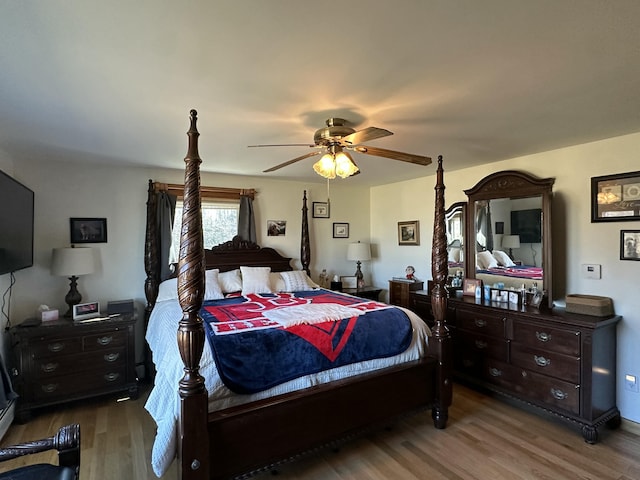 238 Moose Brook Rd, Ludlow, ME 04730 - bedroom with a ceiling fan and wood finished floors