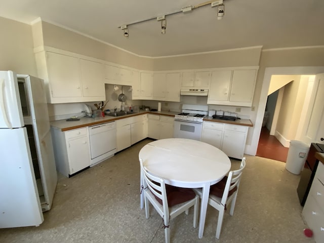 kitchen featuring a sink, white cabinetry, white appliances, track lighting, and under cabinet range hood