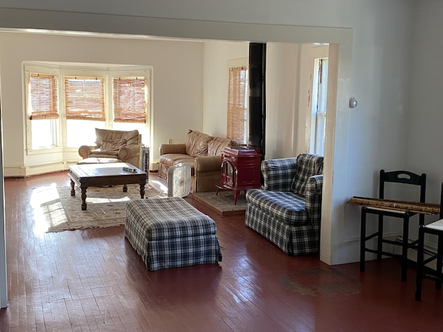 living area with hardwood / wood-style flooring