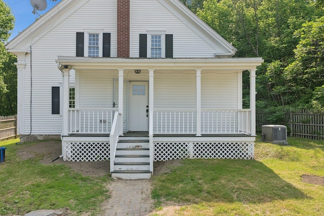 581 Bald Hill Rd, New Gloucester, ME 04260 - view of front of property featuring covered porch and central AC unit
