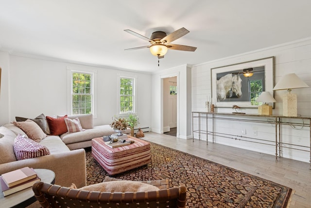 581 Bald Hill Rd, New Gloucester, ME 04260 - living area featuring crown molding, a ceiling fan, wood finished floors, and baseboard heating