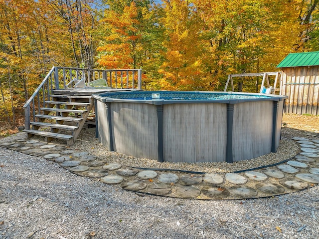 450 Greenwoods Rd, Peru, ME 04290 - outdoor pool featuring a wooden deck and stairs